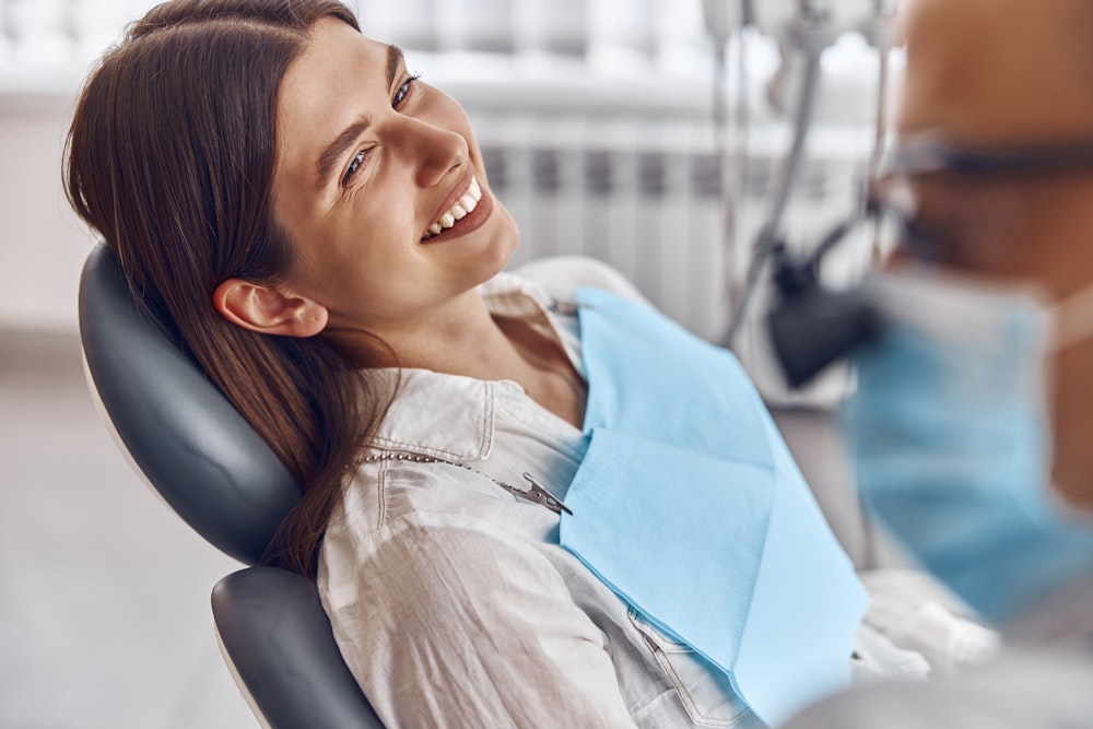 Woman smiling in dental chair