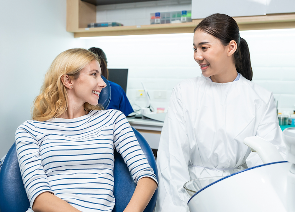 woman smiling in the dental chair