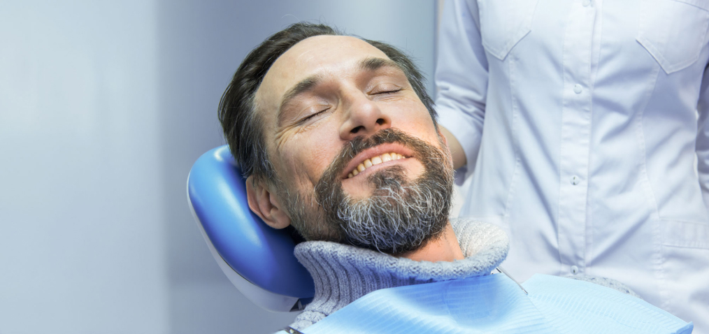 Relaxed dental implant patient in the exam chair