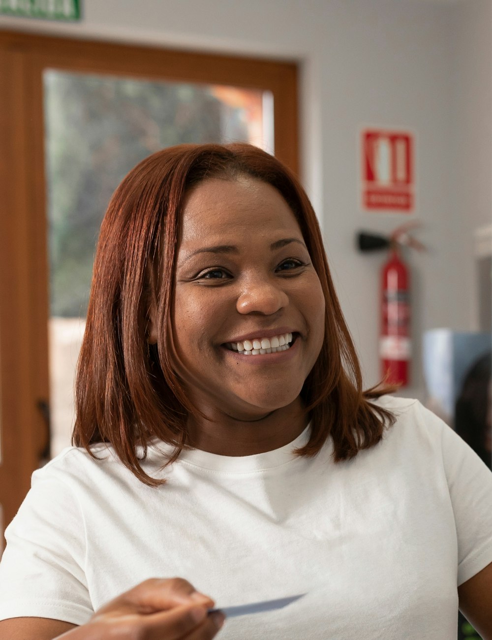Invisalign patient paying for her treatment
