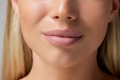 Close up of woman's chin after chin augmentation