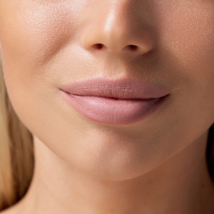 Close up of woman's chin after chin augmentation