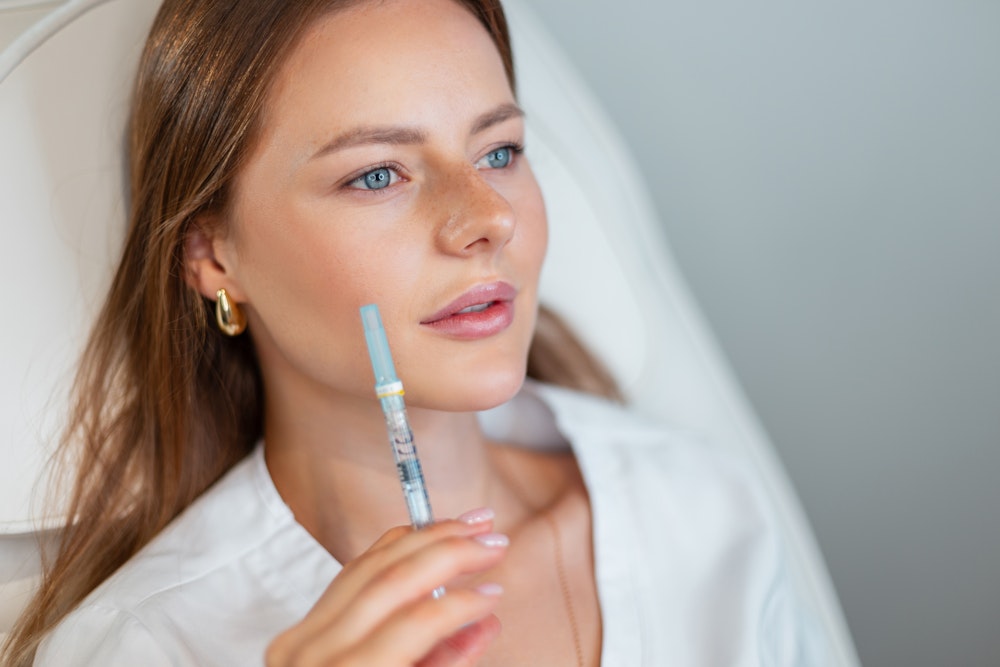 Woman getting a BOTOX consultation