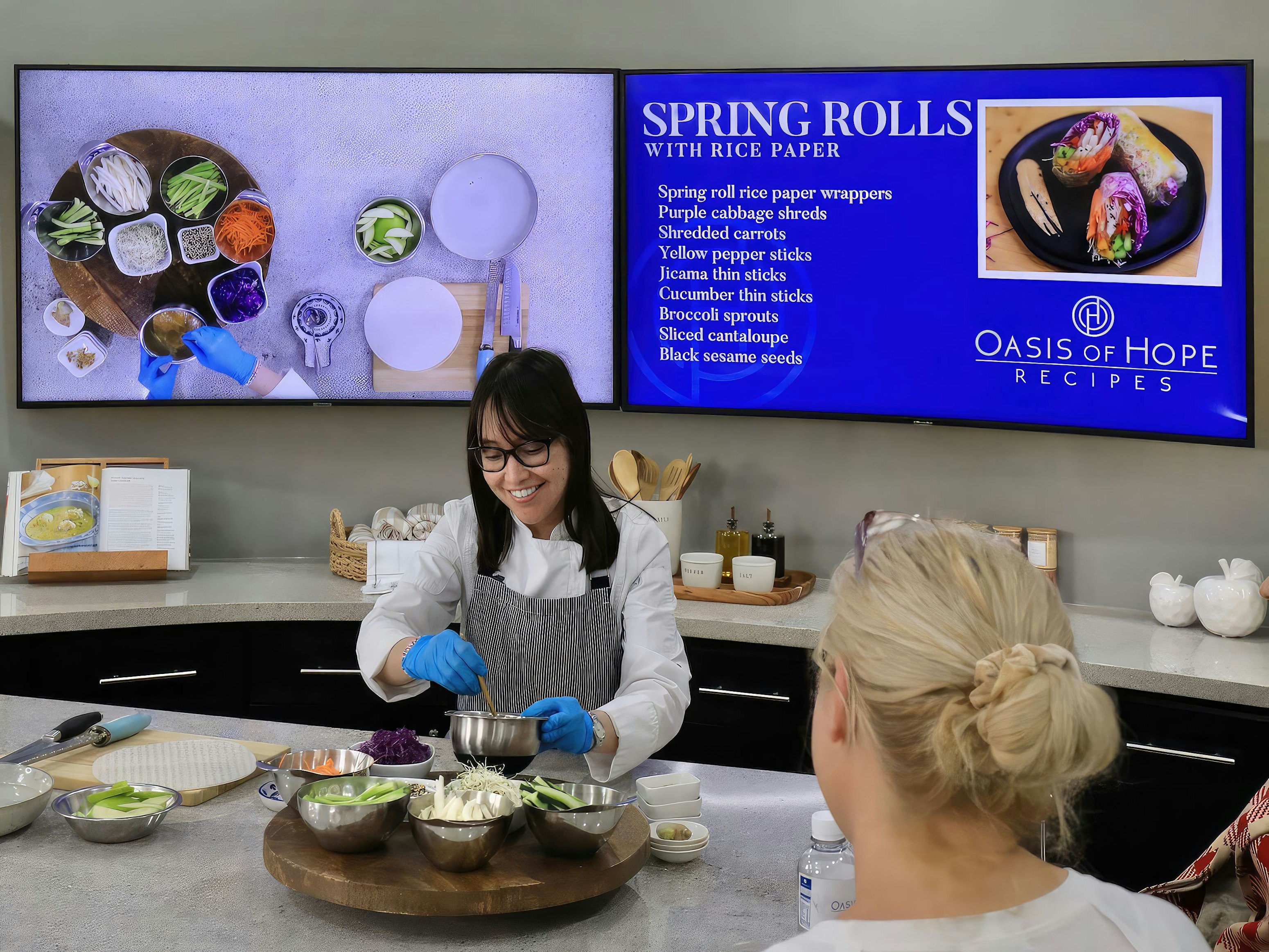 Dr. Paulina and nurses outside Oasis of Hope Hospital entrance
