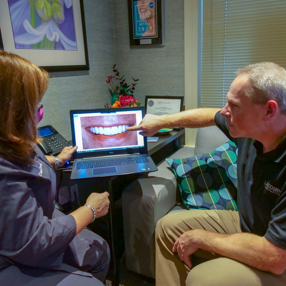 Dr. Summer Lerch and Patient reviewing teeth on computer