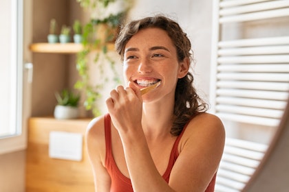 Patient brushing teeth