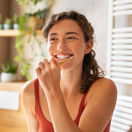 Patient brushing teeth