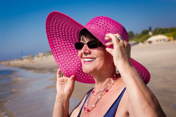 woman wearing hat in the sun