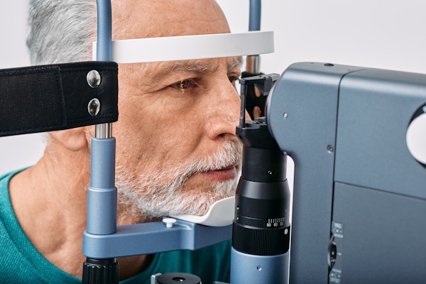 Older man getting eye exam