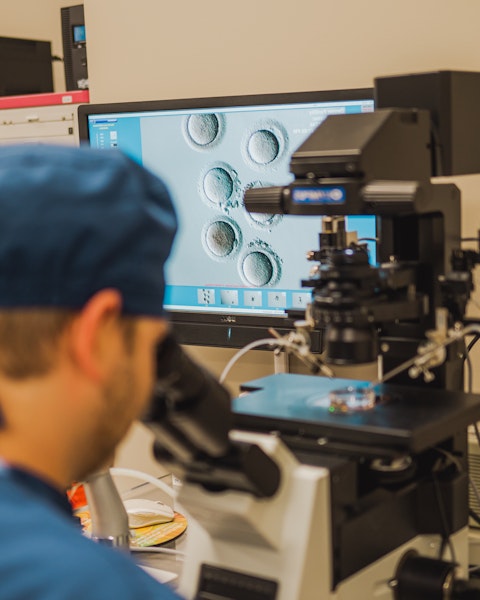 Our doctor examining specimen