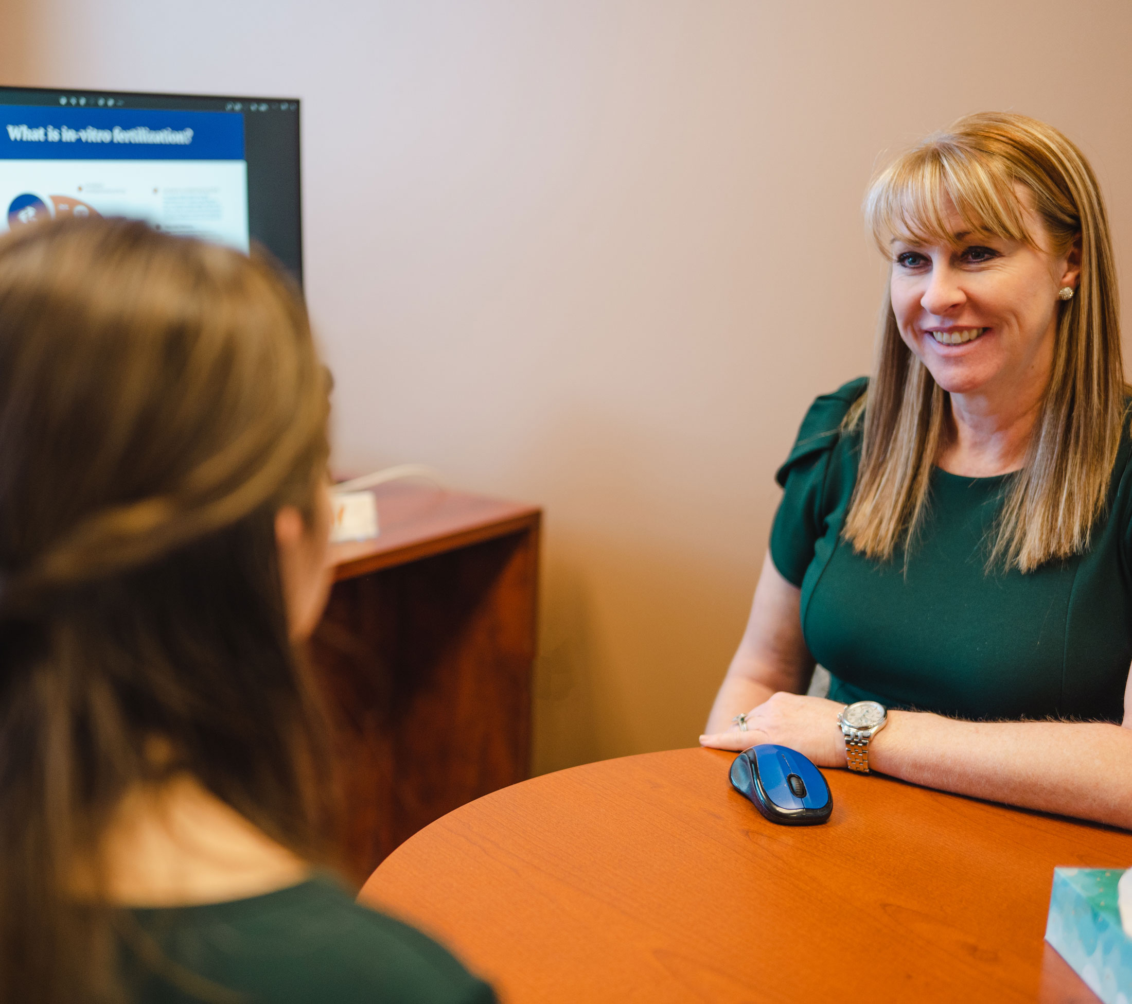 Dr. Ambler consulting with patient