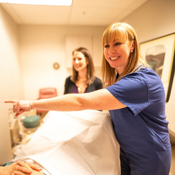 Dr. Ambler with a patient