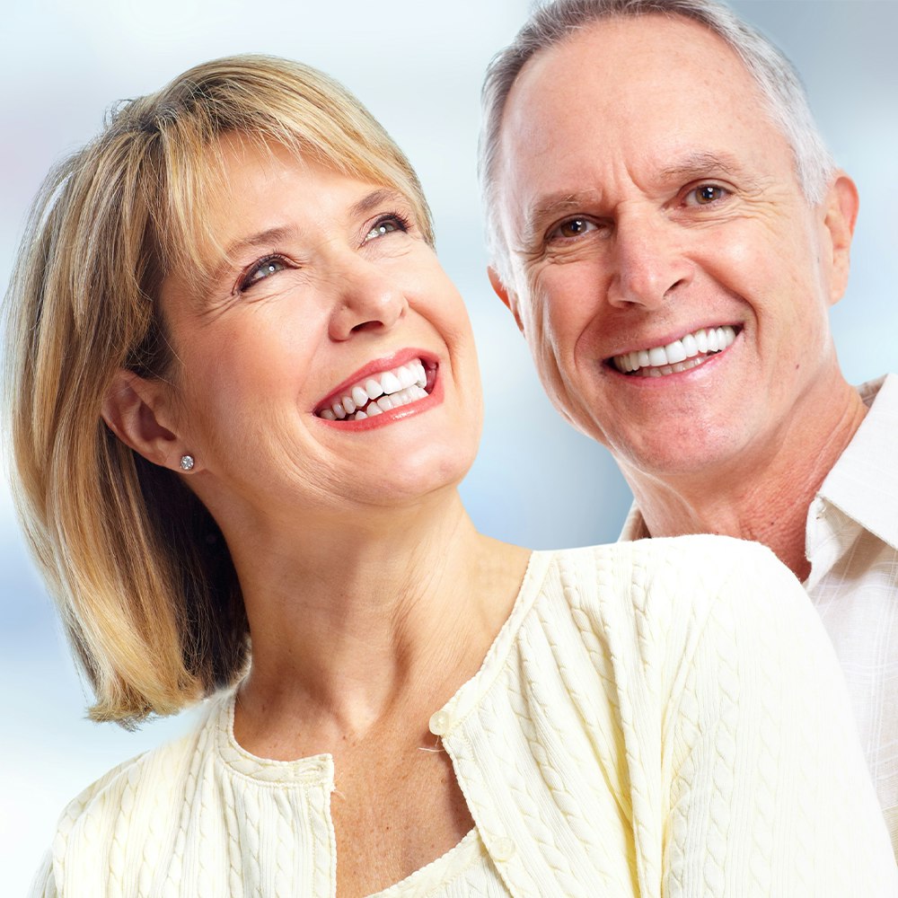 smiling mature man and woman