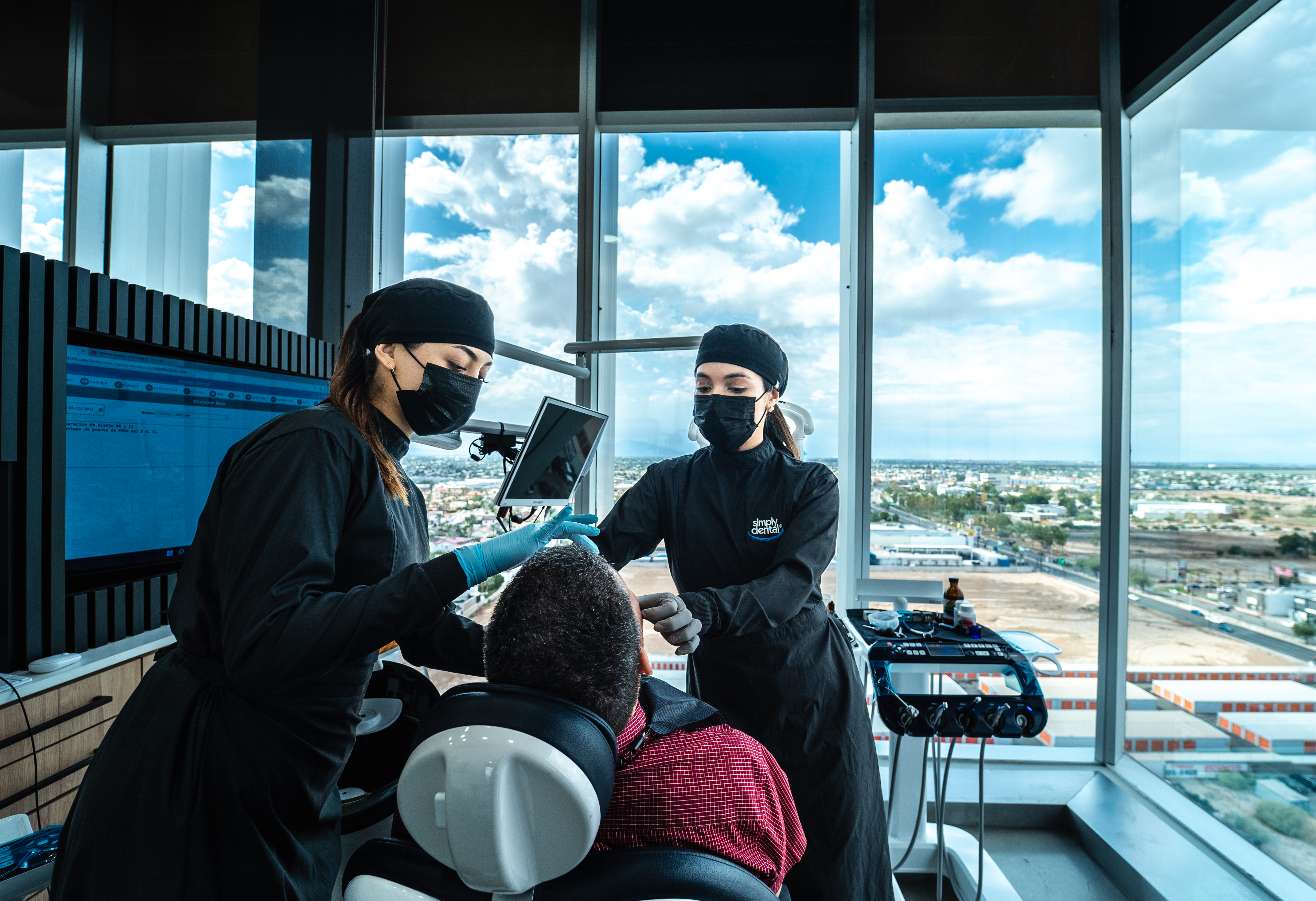 simply dental team preparing for a tooth extraction