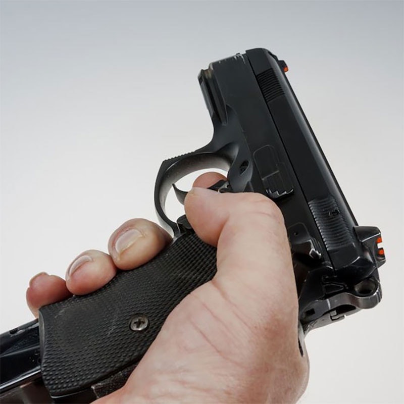 Person holding gun