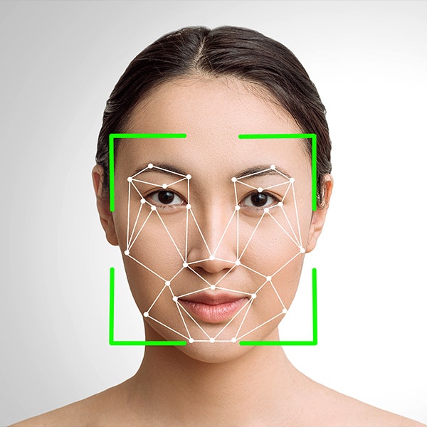 a woman's face with many data points