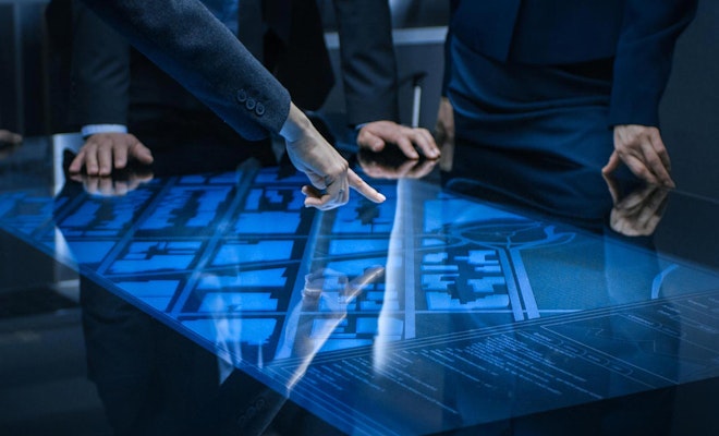 Government agents looking at evidence