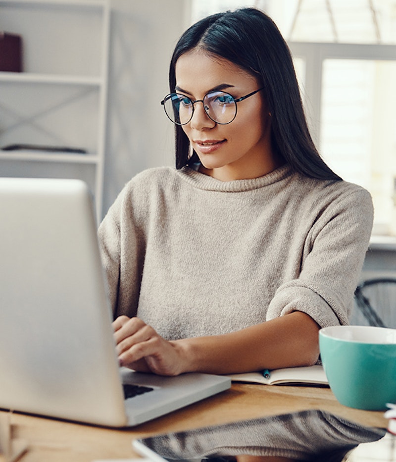 Woman doing research on a laptop
