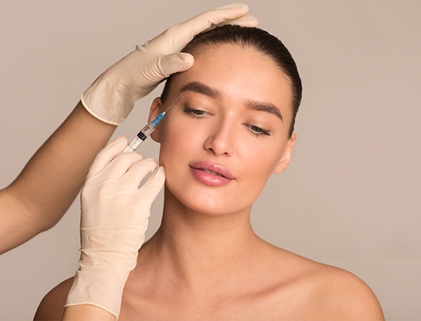 Woman getting a JUVEDERM injection