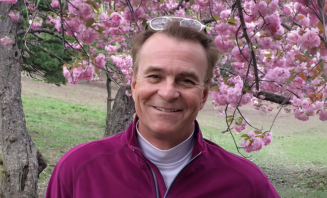 Dr. Craig Foster smiling outdoors