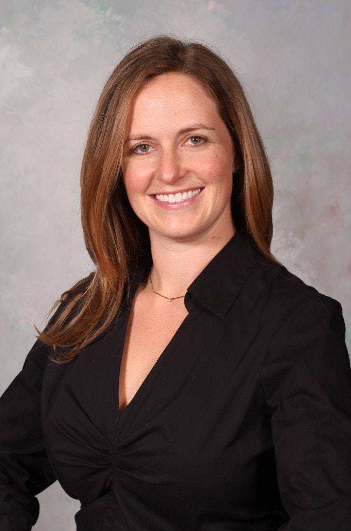 headshot of our dentist, Dr. Hillary Mendillo