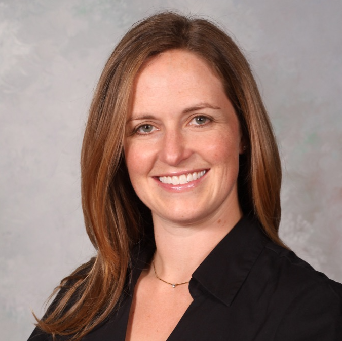 headshot of our dentist, Dr. Mendillo