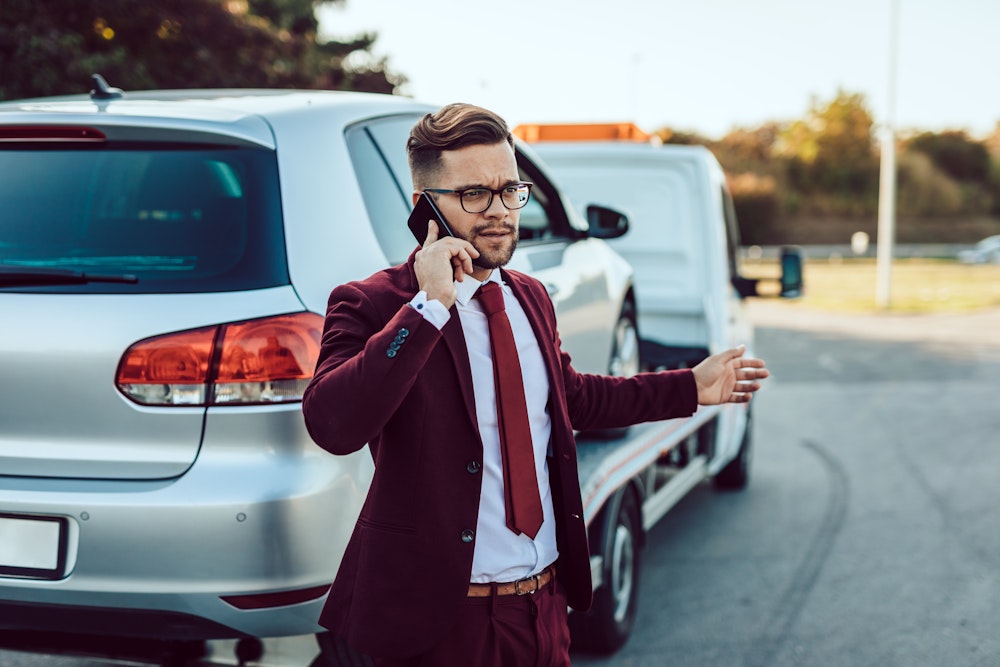 Man on phone call after truck accident