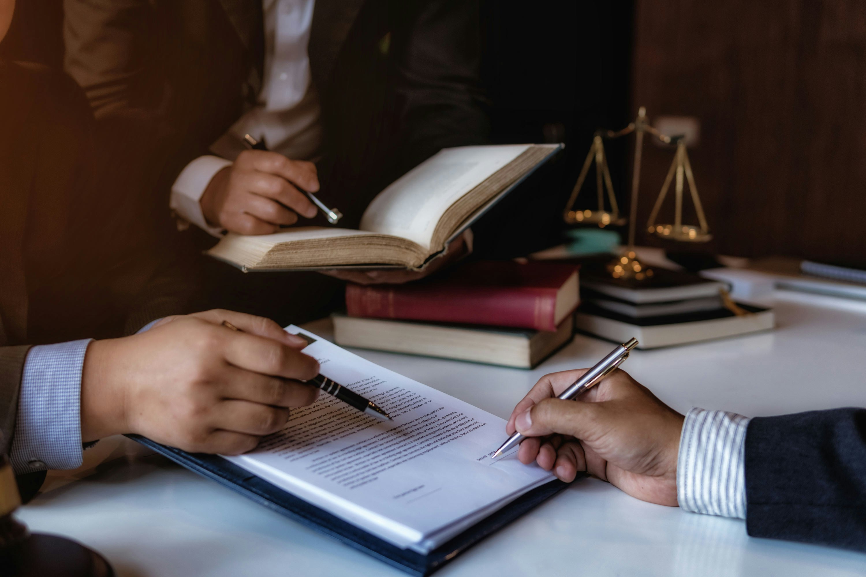 Lawyers going over documentation