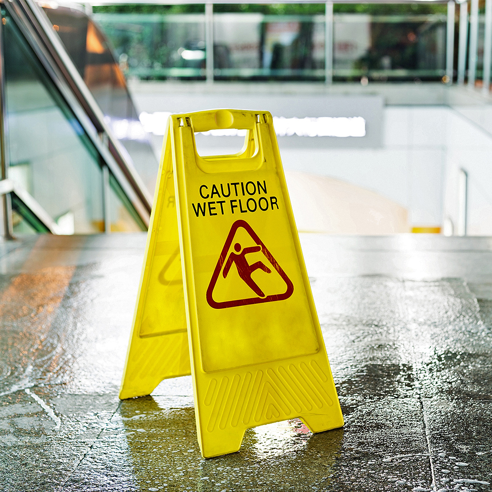 Wet floor sign in building