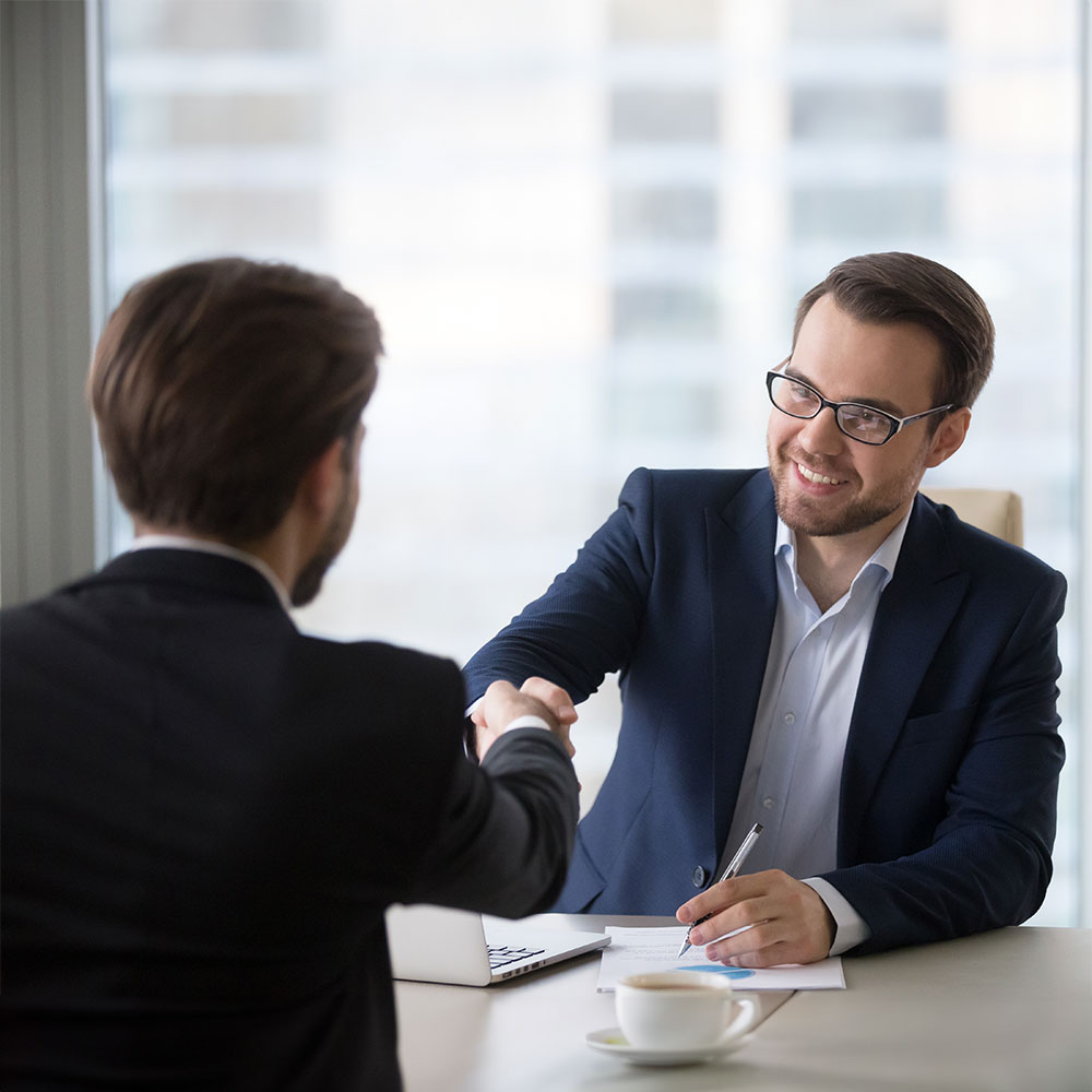 lawyer and client shaking hands