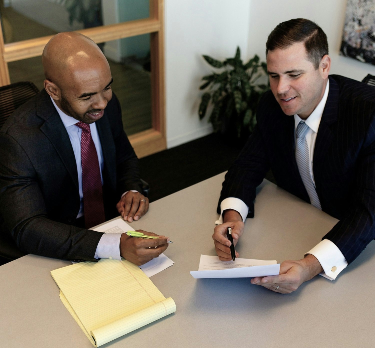 attorneys landay and roberts reviewing a contract