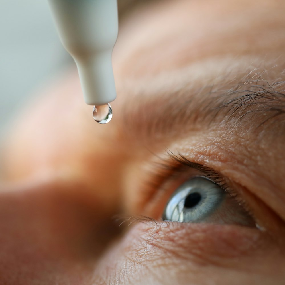 Close-up of eye drops being applied