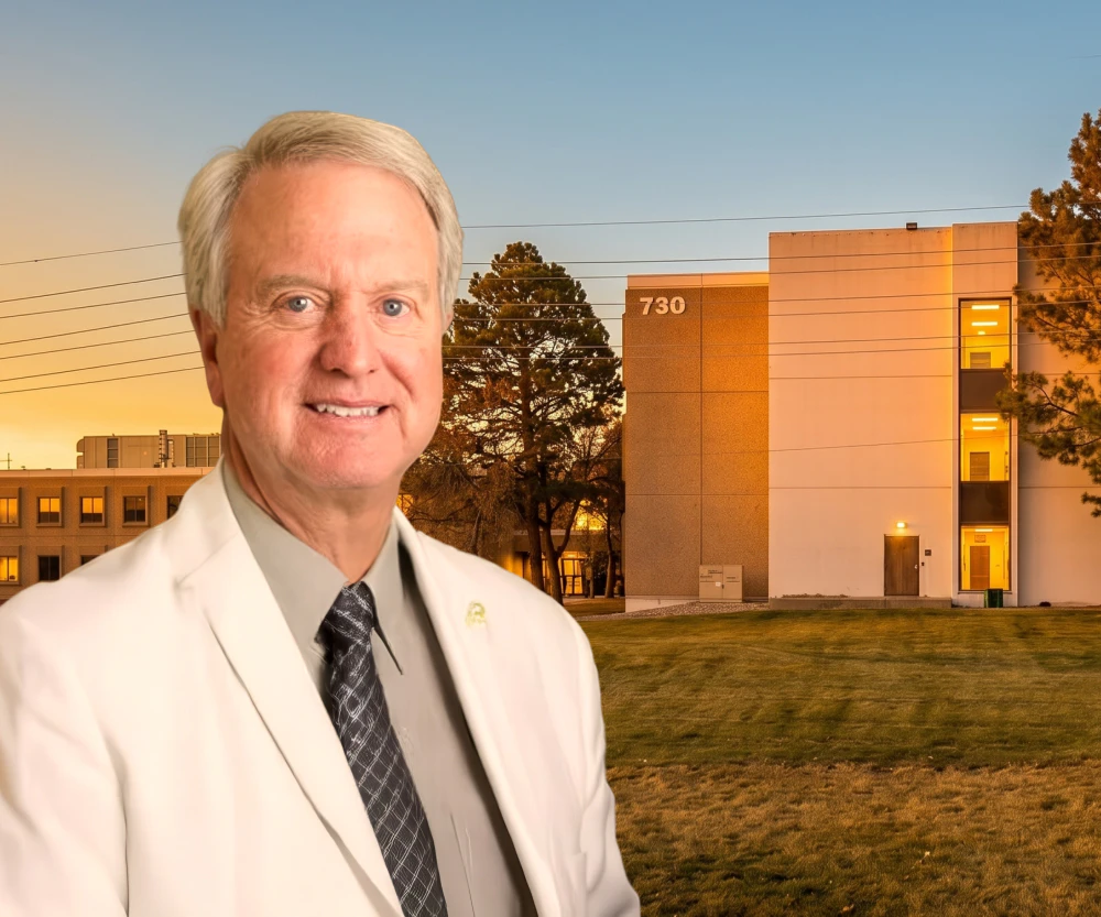 Dr. James Burcham in front of our office