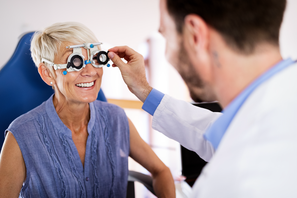 woman getting her eyes checked at an eye doctor