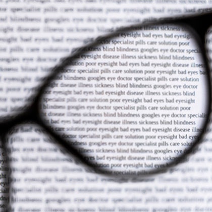 View through glasses and outside of glasses blurred