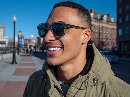 smiling man wear protective eyewear