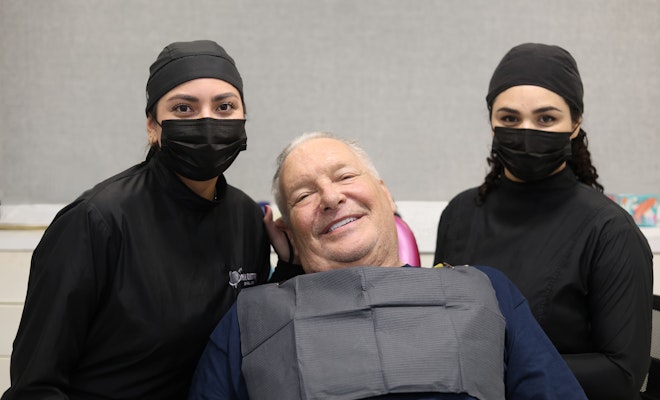 patient smiling with staff
