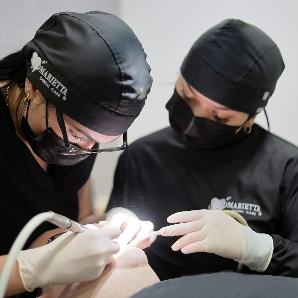 Our dentists working on a patient