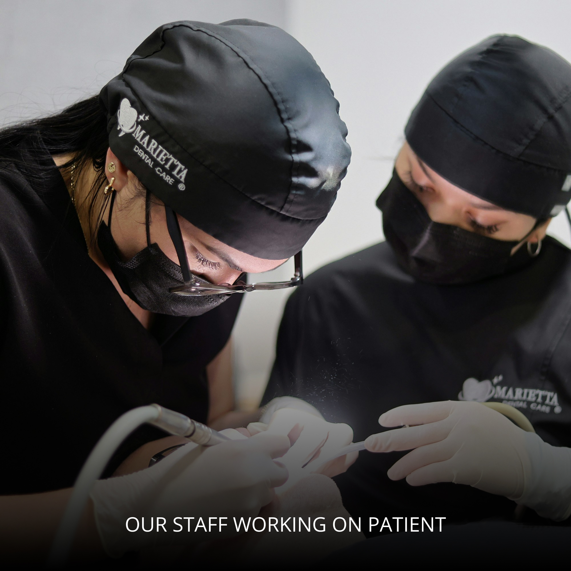 Staff working on patient