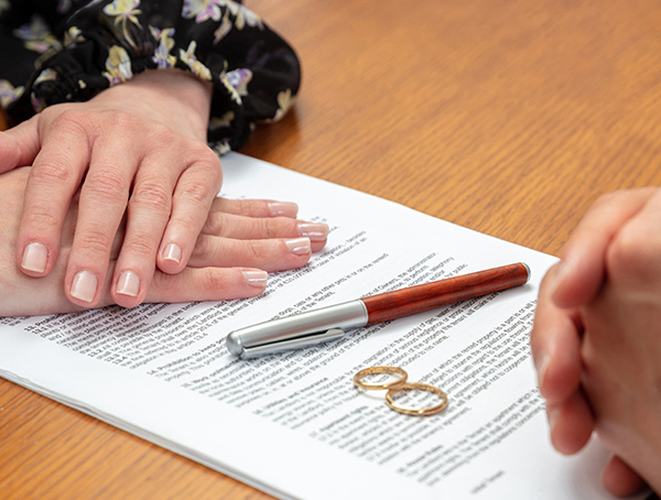 wedding rings on a legal document