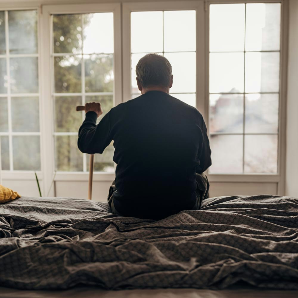 woman on nursing home bed