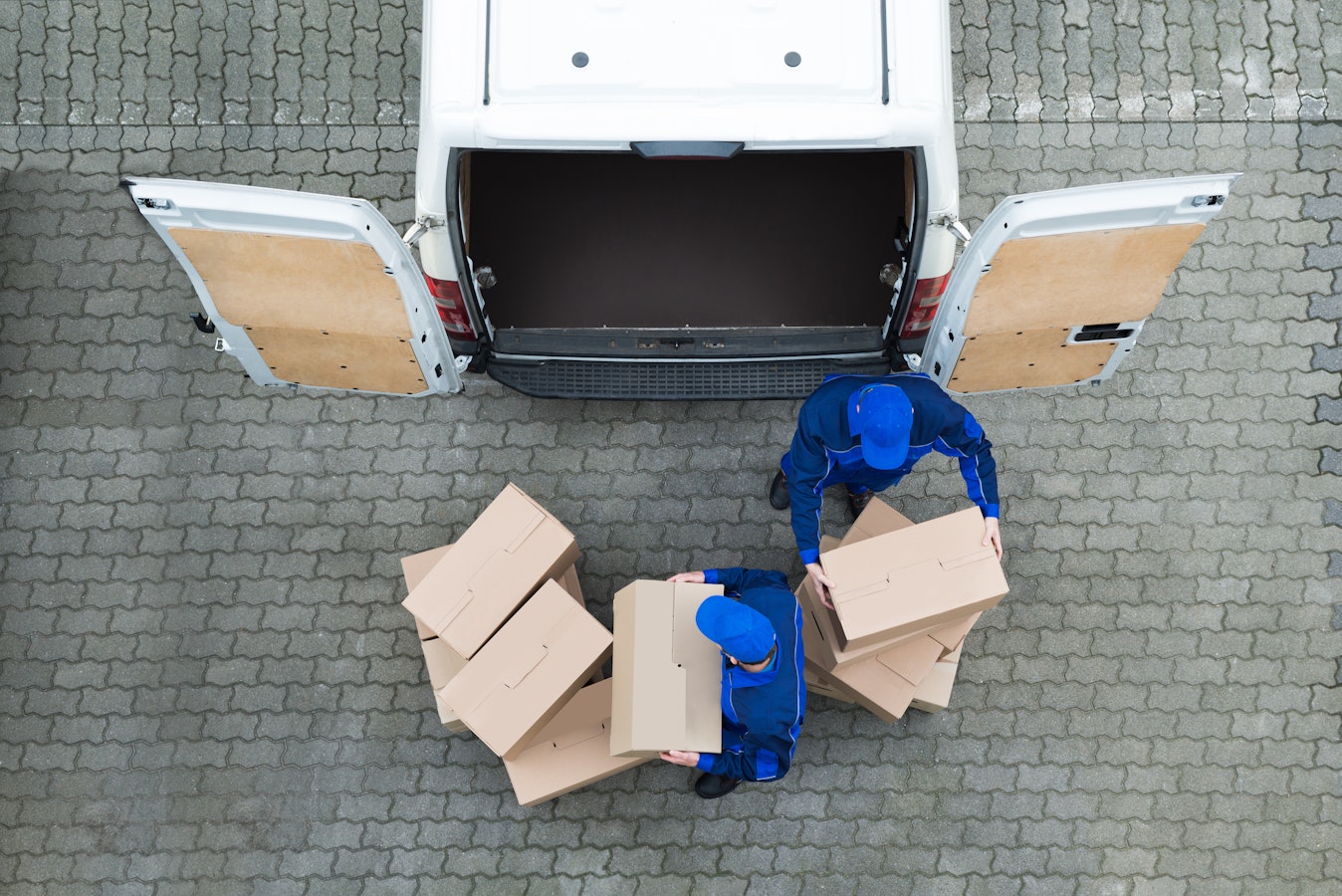 delivery workers loading van