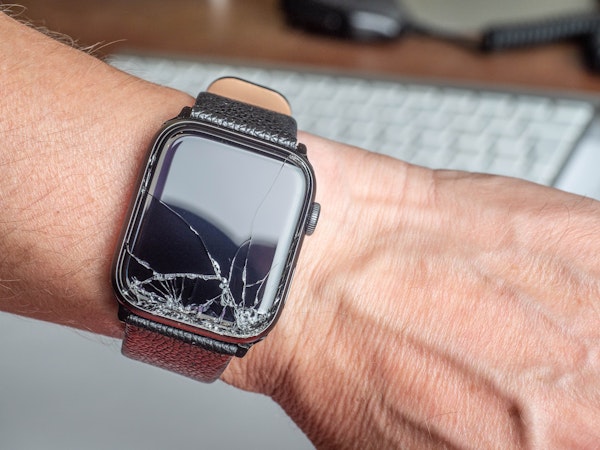 close-up of a wrist wearing a broken watch