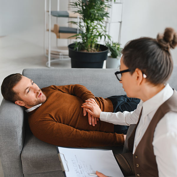 Man talking to therapist