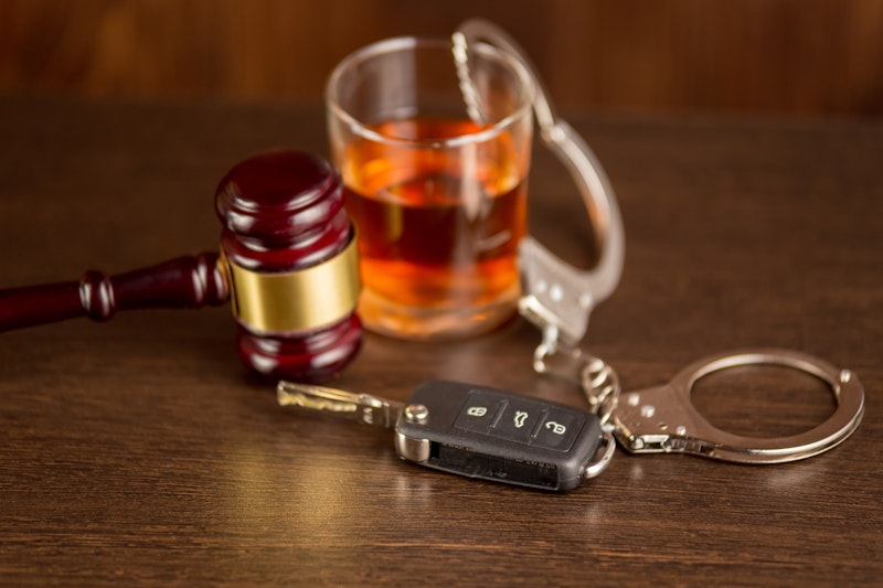 Keys with a glass of whiskey