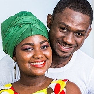 man and woman smiling