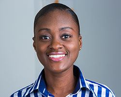 woman in blue and white stripped shirt