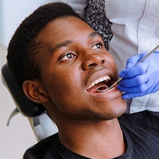 man getting periodontal therapy