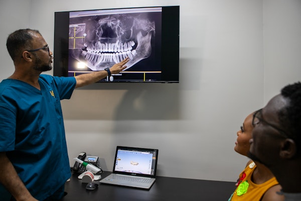dentist explaining computer, digital x-rays