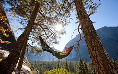 Hiker relaxing in a hammock